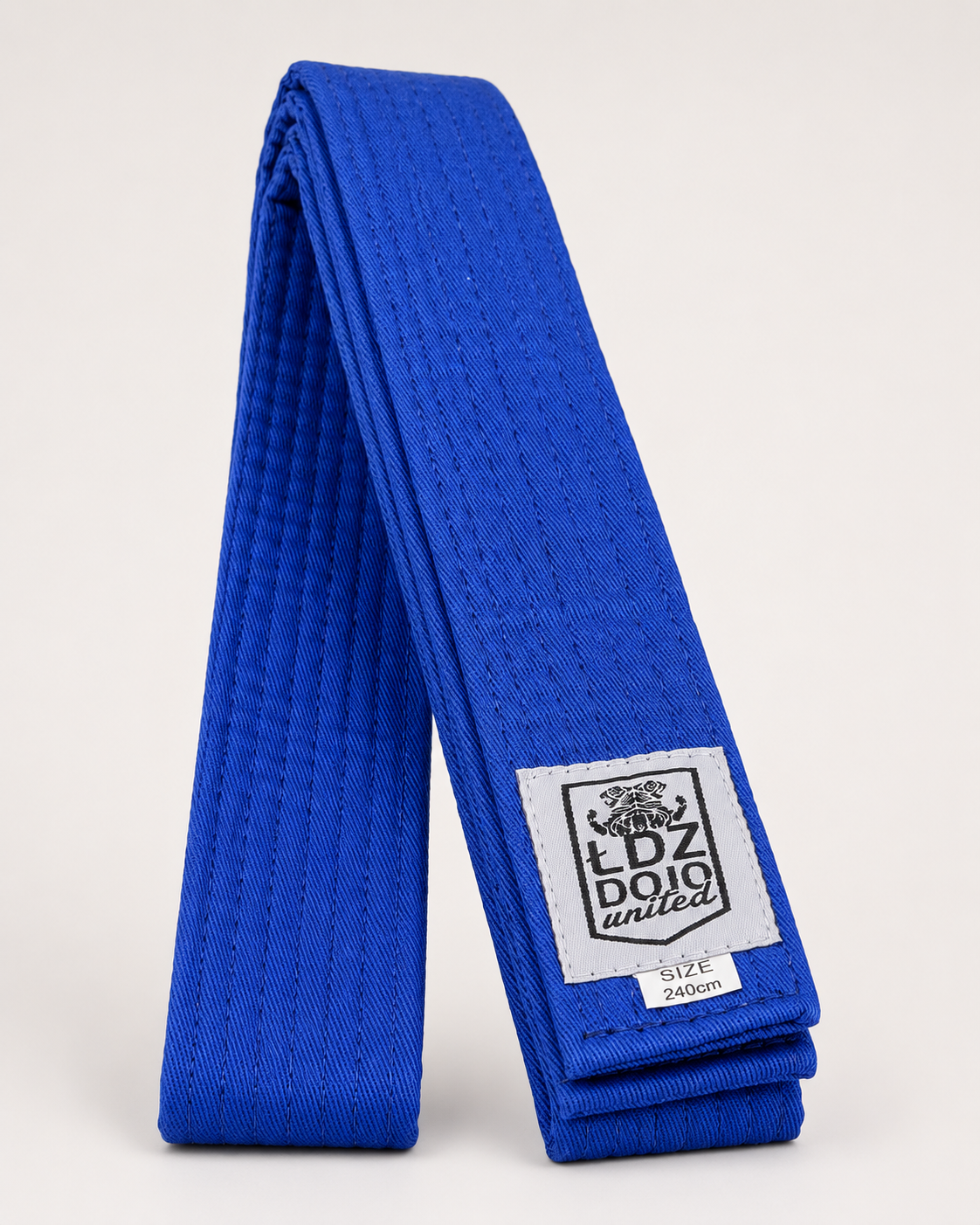 Niebieski pas z logo ŁDZ Dojo United